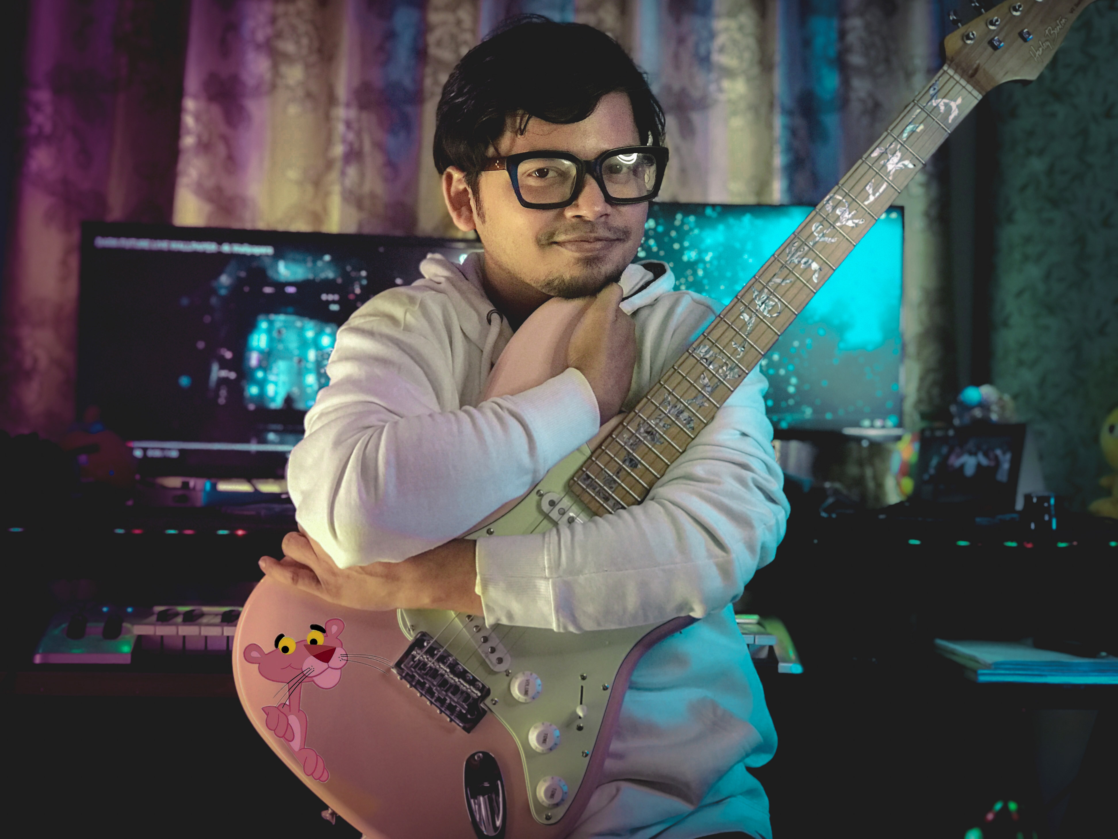 Samee recording in the studio with Pink Panther Stratocaster